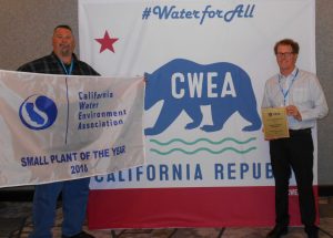 Employees accept CWEA award