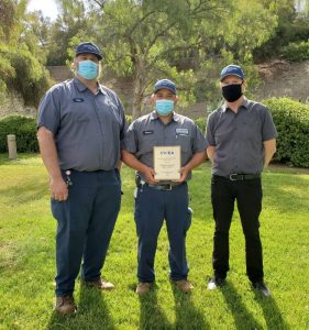 employees holding CWEA Plant of the Year award plaque
