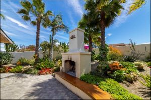 water-smart landscape around patio and chimney